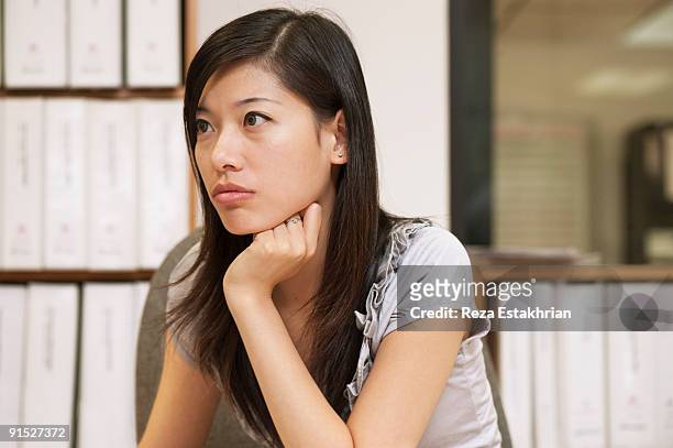 portrait of asian businesswoman - hand on chin stock pictures, royalty-free photos & images