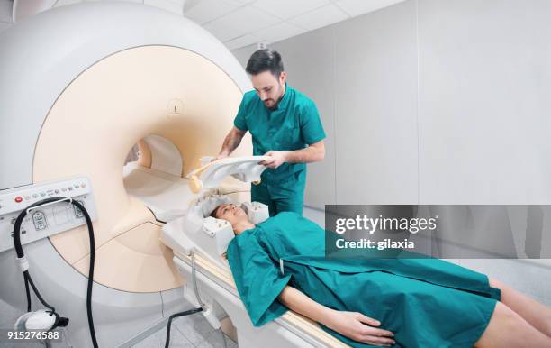 mri scanning procedure. - brain cancer stock pictures, royalty-free photos & images