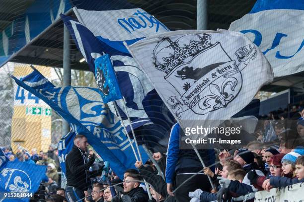 Suporters of Darmstadt are seen with flags during the Second Bundesliga match between SV Darmstadt 98 and MSV Duisburg at Merck-Stadion am...