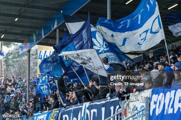 Suporters of Darmstadt are seen with flags during the Second Bundesliga match between SV Darmstadt 98 and MSV Duisburg at Merck-Stadion am...