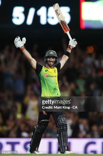 Glenn Maxwell of Australia celebrates victory and scoring a century during the Twenty20 International match between Australia and England at...