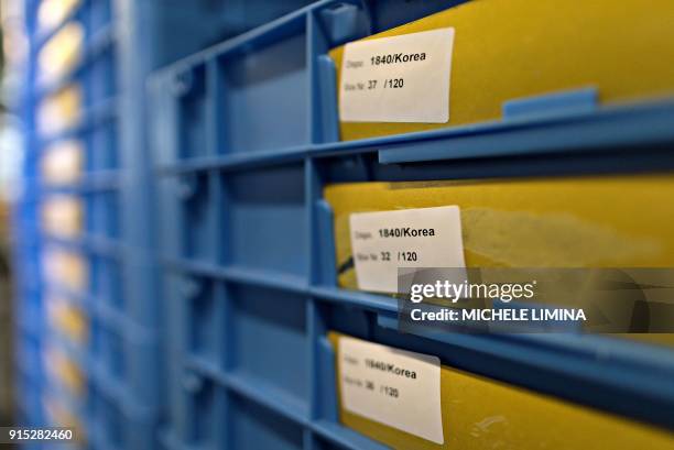 This photograph taken on February 7 shows the production of BEREG-KIT for drug and doping control, at Berlinger AG facility in Ganterschwil, which...