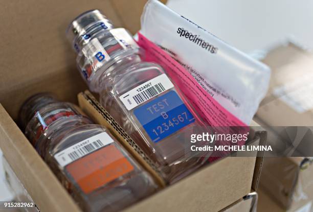 This photograph taken on February 7 shows a BEREG-KIT for drug and doping control, at Berlinger AG facility in Ganterschwil, which are scheduled to...