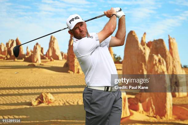 Lee Westwood of England watches his tee shot on the 6th hole during the pro-am ahead of the World Super 6 at Lake Karrinyup Country Club on February...