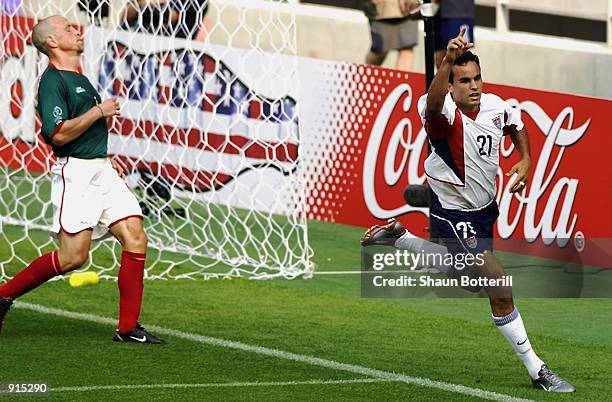 Landon Donovan of the USA celebrates scoring the second goal during the Mexico v USA, World Cup Second Round match played at the Jeonju World Cup...