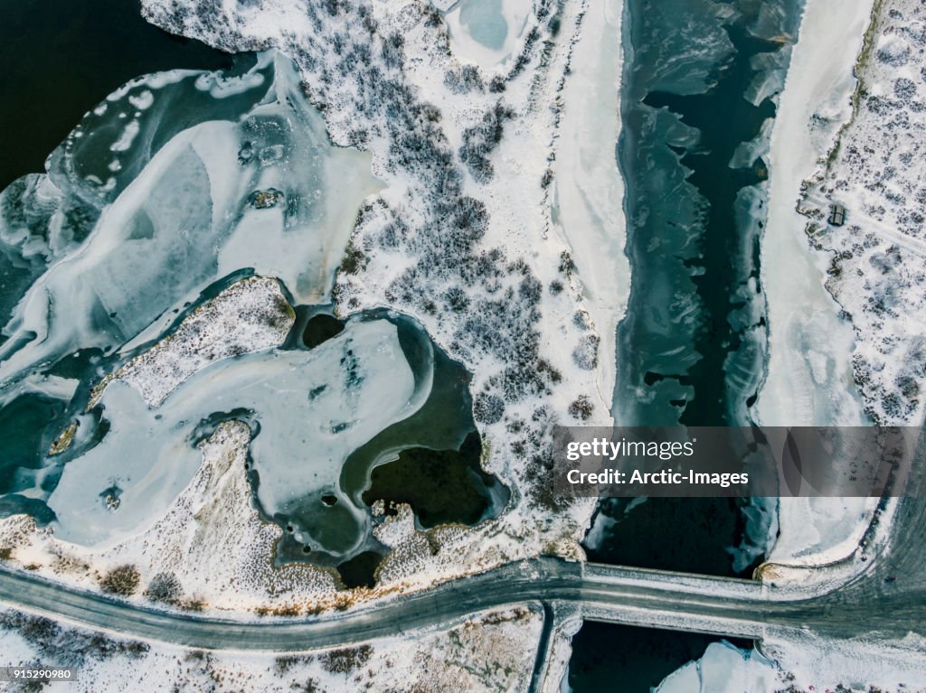 Aerial - Snow and Ice Covered Landscape with Empty Roads