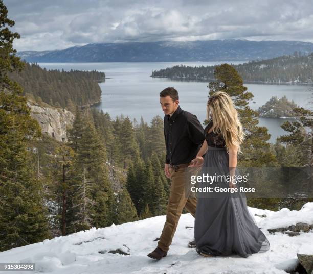 Couple takes their engagement photos at Eagle Falls, located above scenic Emeral Bay, on January 22 in South Lake Tahoe, California. Though a...