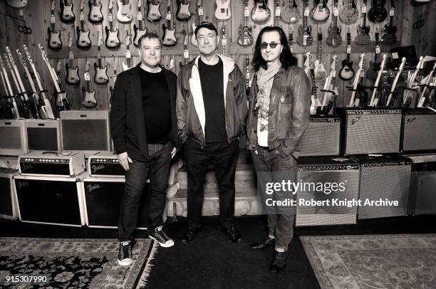 Rush, group portrait, United States, 20th November 2012. L-R Alex Lifeson, Neil Peart, Geddy Lee.