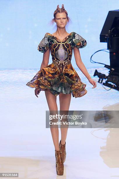 Model walks the runway during Alexander McQueen Pret a Porter show as part of the Paris Womenswear Fashion Week Spring/Summer 2010 at Palais...