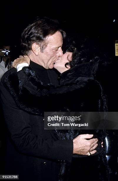 Elizabeth Taylor and husband Richard Burton at JFK airport saying goodbye as Elizabeth leaves for Los Angeles.