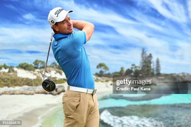 Brett Rumford of Australia watches his tee shot on the 3rd hole during the pro-am ahead of the World Super 6 at Lake Karrinyup Country Club on...