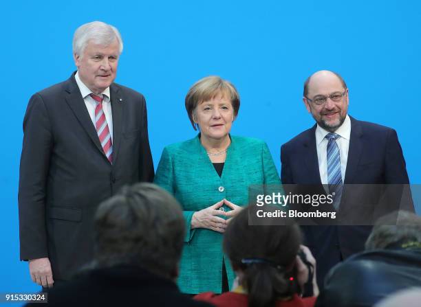 Horst Seehofer, leader of the Christian Social Union party, left, Angela Merkel, Germany's chancellor and leader of the Christian Democratic Union...