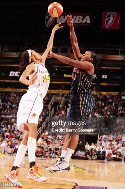 Ebony Hoffman of the Indiana Fever shoots over DeWanna Bonner of the Phoenix Mercury in Game Two of the WNBA Finals during the 2009 NBA Playoffs at...