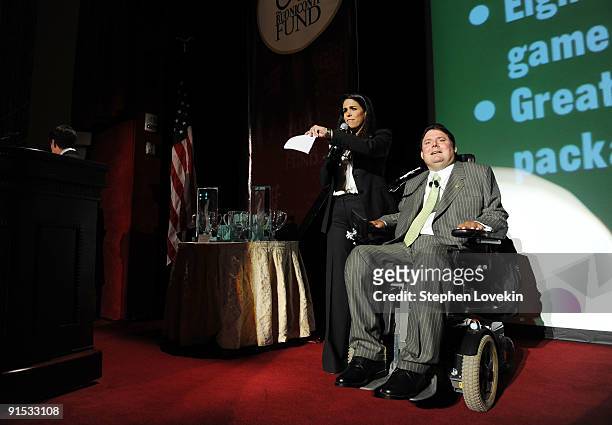 Stephanie Sayfie Aagaard and President of The Miami Project and The Buoniconti Fund to Cure Paralysis Marc Buoniconti speak onstage during The 24th...