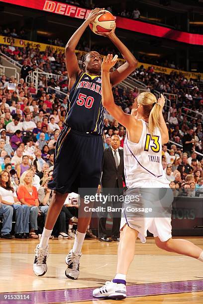 Jessica Davenport of the Indiana Fever shoots over against Penny Taylor of the Phoenix Mercury in Game Two of the WNBA Finals during the 2009 NBA...