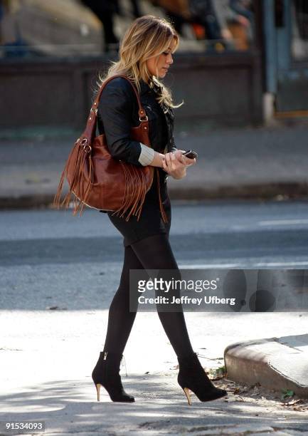 Actress Hilary Duff is seen on location for "Gossip Girl" on the streets of Manhattan on October 6, 2009 in New York City.