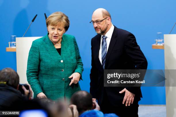 German Chancellor and leader of the German Christian Democrats Angela Merkel and leader of the German Social Democrats Martin Schulz are seen after a...