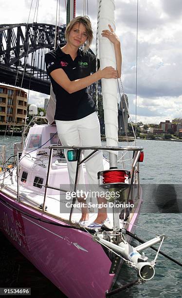 Year old solo sailor Jessica Watson poses on her yacht Ella's Pink Lady during the official launch of her Solo round the world voyage on October 7,...