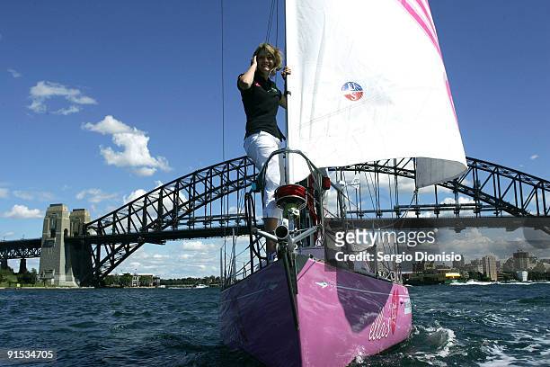 Year old solo sailor Jessica Watson sails her yacht Ella's Pink Lady beneath Sydney Harbour Bridge during the official launch of her solo round the...