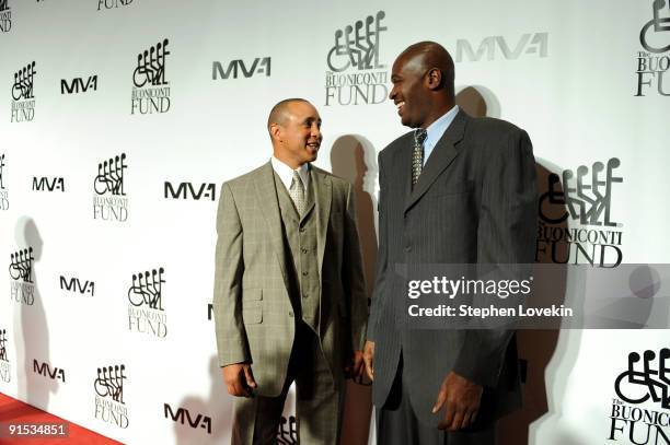 John Starks and Herb Williams attend The 24th Annual Great Sports Legends Dinner benefiting The Buoniconti Fund to Cure Paralysis at The...