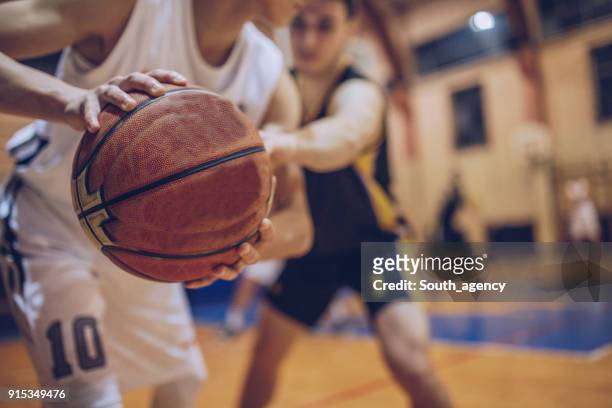 guarding his player - blocking sports activity stock pictures, royalty-free photos & images