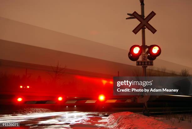 x-ing crossing sign - level crossing stock pictures, royalty-free photos & images