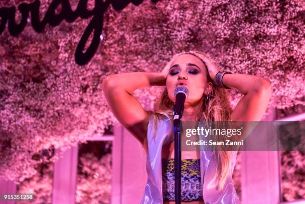 Amanda Joy Michalka performs at Salvatore Ferragamo & Suki Waterhouse celebrate AMO Ferragamo on February 6, 2018 in New York City.