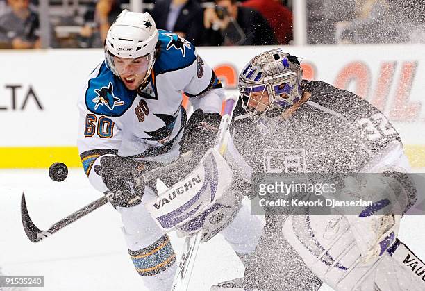 Jason Demers of the San Jose Sharks tries to score against goalie Jonathan Quick of the Los Angeles Kings during the first period of the NHL hockey...