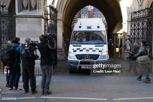 Members of the media look on as a prison van carries convicted rapist John Worboys from the High Court on February 7, 2018 in London, England. A...