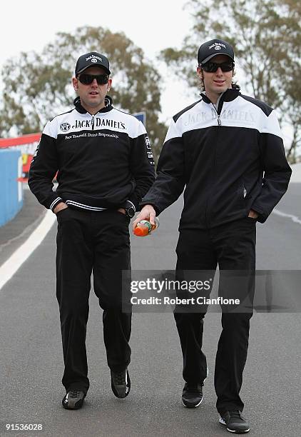 Todd Kelly and Rick Kelly of Jack Daniels Racing walk the track in preperation for the Bathurst 1000, which is round 10 of the V8 Supercars...