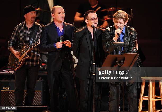 The Edge, Gavin Friday, Bono and Shane MacGowan perform at Carnegie Hall during the NIGHTS Concert celebrating the music of Gavin Friday on October...