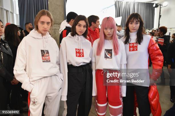 Models prepare backstage before the Li-Ning Fall/Winter 2018 Collection Fashion Show during 2018 New York Fashion Week at Skylight Modern on February...