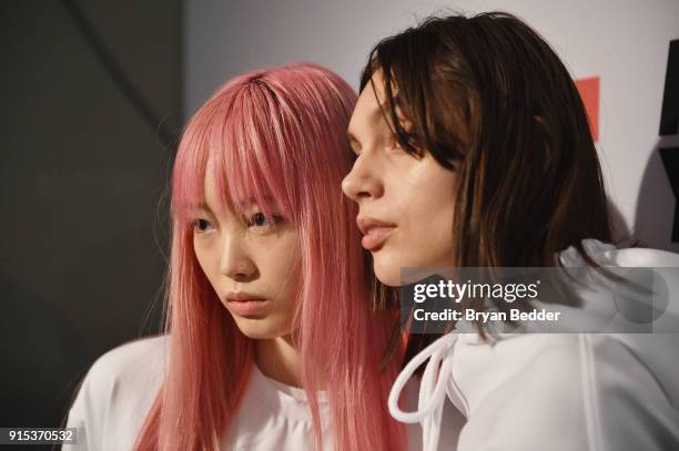 Model Fernanda Ly poses backstage before the Li-Ning Fall/Winter 2018 Collection Fashion Show during 2018 New York Fashion Week at Skylight Modern on...