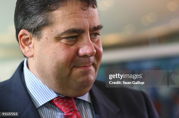 German Environment Minister and Social Democrat Sigmar Gabriel arrives for the final German weekly cabinet meeting of the current government at the...