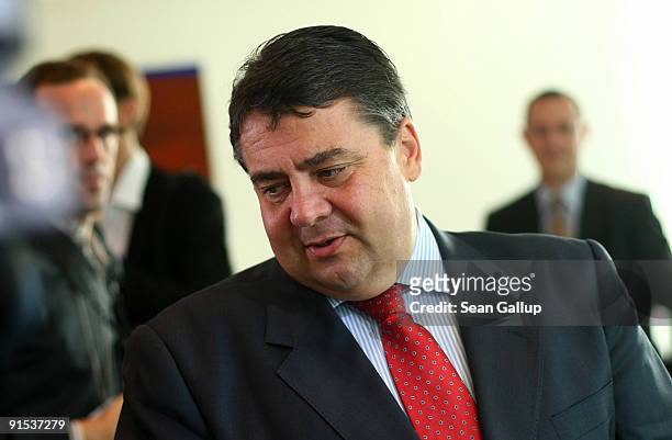 German Environment Minister and Social Democrat Sigmar Gabriel arrives for the final German weekly cabinet meeting of the current government at the...