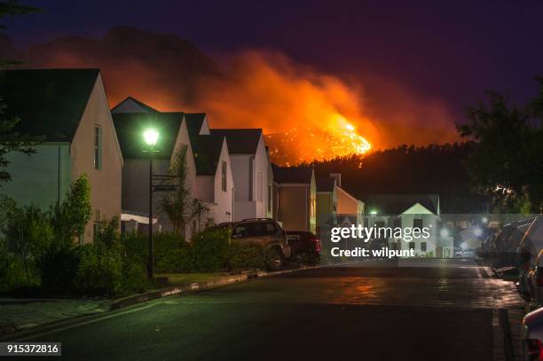 fire view - natural disaster house stock pictures, royalty-free photos & images