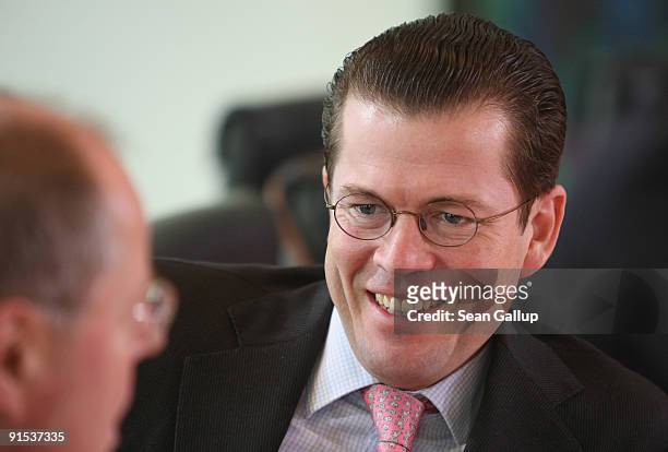 German Economy Minister and Christian Democrat Karl-Theodor zu Guttenberg arrives for the final German weekly cabinet meeting of the current...