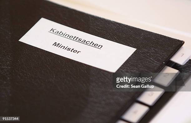 Government minister's cabinet meeting folder sits on the main table prior to the final German weekly cabinet meeting of the current government at the...