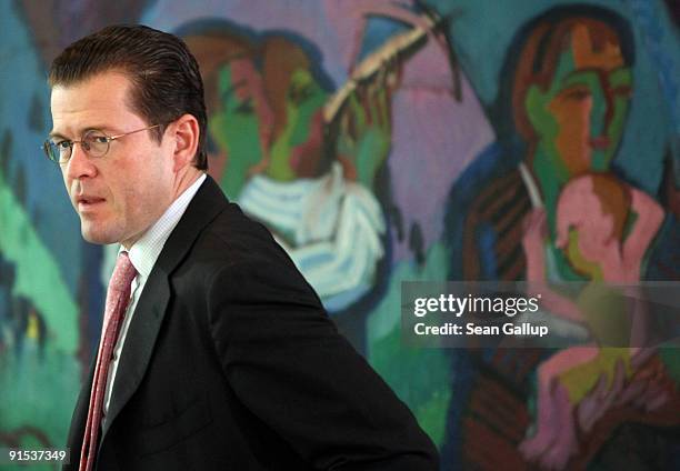 German Economy Minister and Christian Democrat Karl-Theodor zu Guttenberg arrives for the final German weekly cabinet meeting of the current...