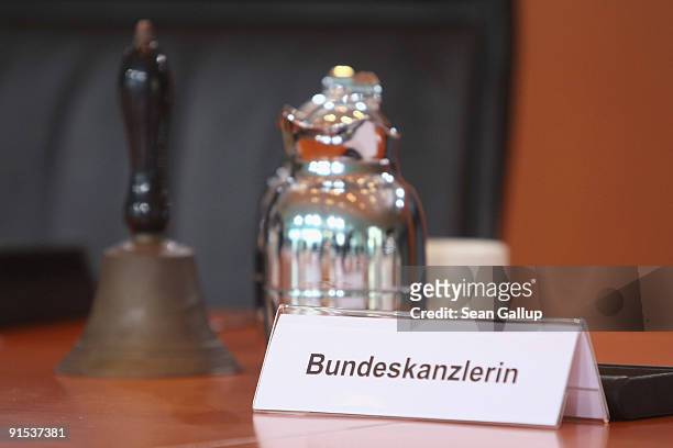 Place card that reads: "Chancellor" sits on the main table prior to the final German weekly cabinet meeting of the current government at the...