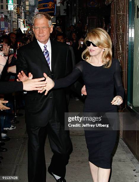 David Letterman and Madonna visit the ''Late Show with David Letterman'' at the Ed Sullivan Theater on September 30, 2009 in New York City.