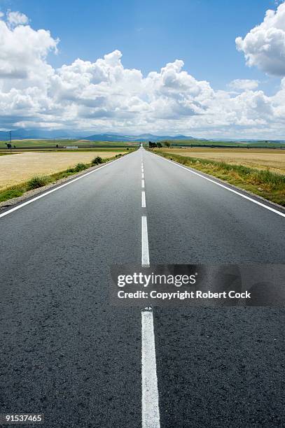 empty highway in spain - straight stockfoto's en -beelden