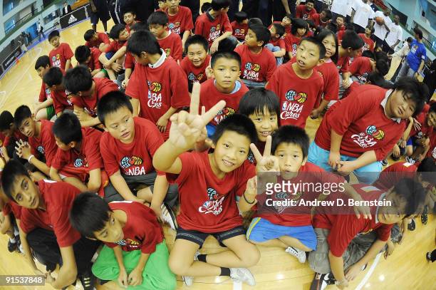 Children poses following a clinic with the Indiana Pacers during an NBA Cares event on October 7, 2009 at Taipei Gymnasium in Taipei, Taiwan. NOTE TO...