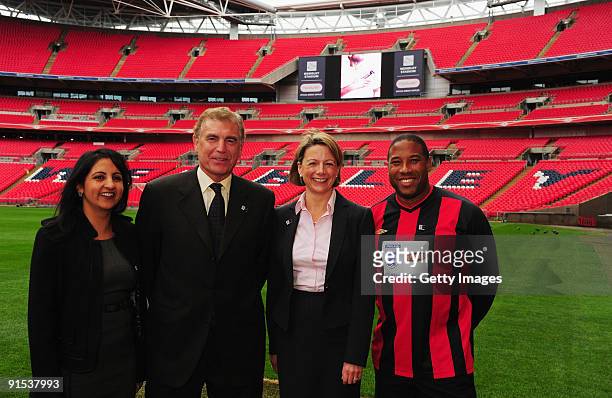 Bet Sandhu, Trade Marketing manager at Mars, Sir Trevor Brooking, Mars CEO Fiona Dawson and John Barnes pose for a photo during the launch of the...