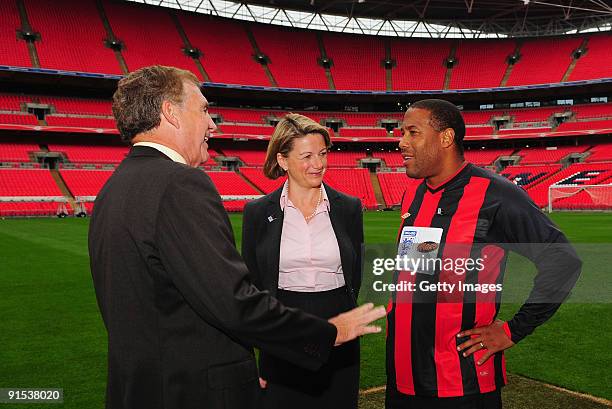 Sir Trevor Brooking, Mars CEO Fiona Dawson and John Barnes chat during the launch of the Mars sponsorship of the England football team at Wembley...