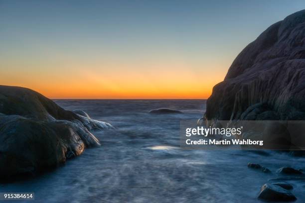 bare rocks coastline sunset - kattegat stock pictures, royalty-free photos & images