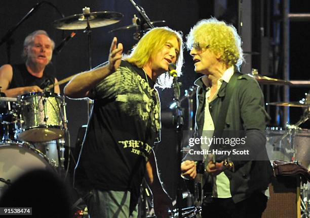 Martin Chambers, Joe Elliott of Def Leppard and Ian Hunter of Mott The Hoople perform on stage at Hammersmith Apollo on October 1, 2009 in London,...