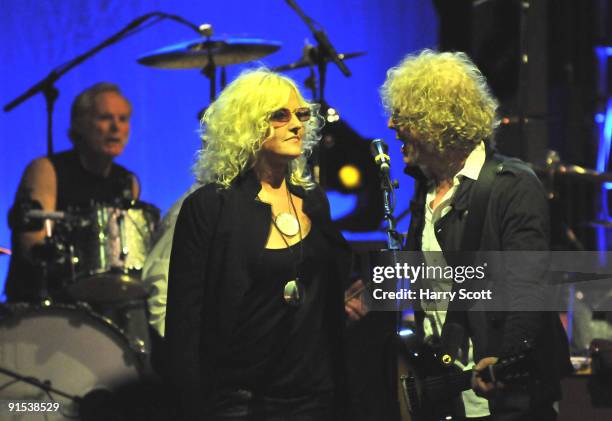 Martin Chambers and Ian Hunter of Mott The Hoople with his daughter Tracie Hunter performing on stage at Hammersmith Apollo on October 1, 2009 in...