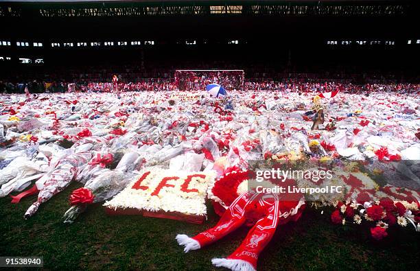 Day or so after the dreadful tragedy, floral tributes fill the Spion Kop stand and spill over onto the Anfield turf laid in memory of the 96 people...