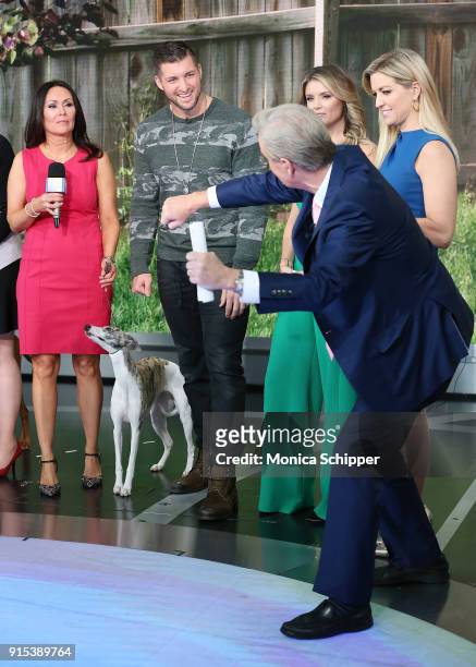 Gail Miller Bisher and Tim Tebow, with Jillian Mele, Ainsley Earhardt and Steve Doocy, visit Fox News Studios on February 7, 2018 in New York City.